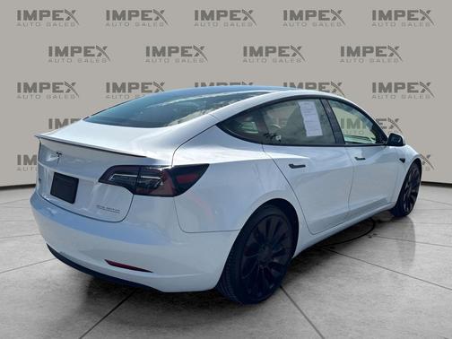 Yellow 2023 Tesla Model 3 Performance