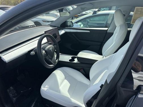 Solid Black 2024 Tesla Model Y Long Range Dual Motor All-Wheel Drive