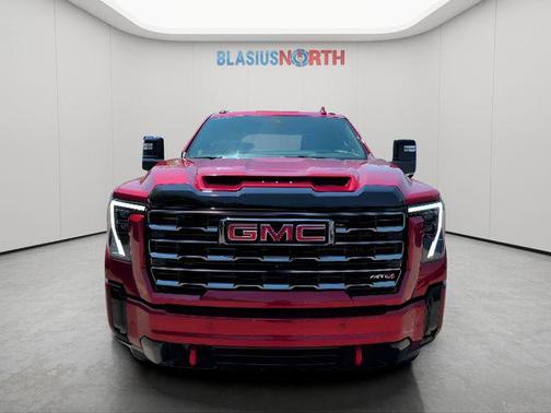 Volcanic Red Tintcoat 2025 GMC Sierra 2500 AT4