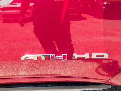 Volcanic Red Tintcoat 2025 GMC Sierra 2500 AT4