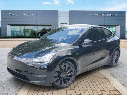 Solid Black 2024 Tesla Model Y Performance Dual Motor All-Wheel Drive