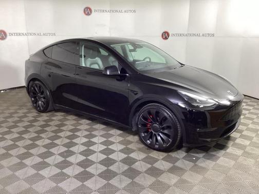 Solid Black 2024 Tesla Model Y Performance Dual Motor All-Wheel Drive