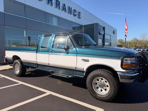 Blue 1995 Ford F-250 XLT SuperCab H/D