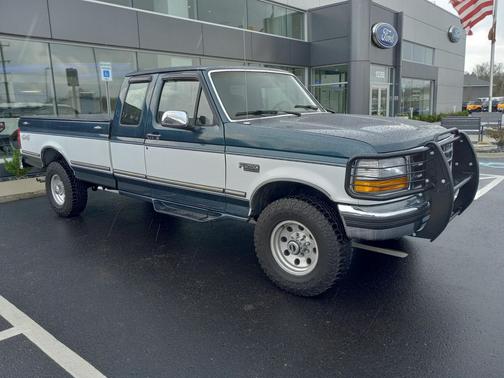 Blue 1995 Ford F-250 XLT SuperCab H/D