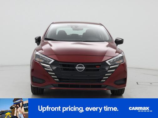 Red 2024 Nissan Versa SR