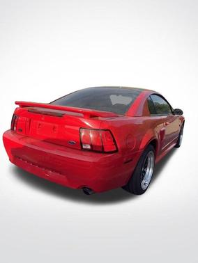 Maroon 2004 Ford Mustang GT