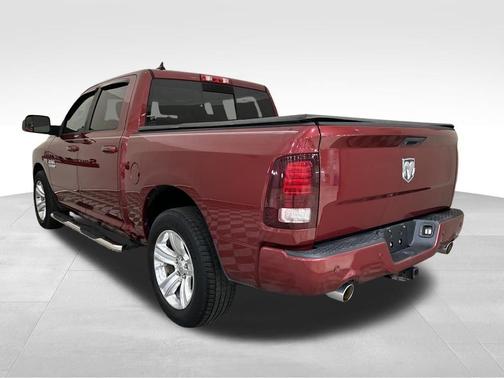 Red 2014 RAM 1500 Sport
