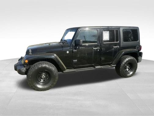 Black 2014 Jeep Wrangler Unlimited Sahara