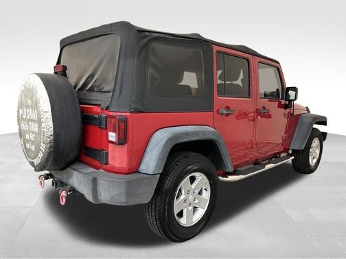 Red 2014 Jeep Wrangler Unlimited Sport
