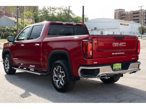 Volcanic Red Tintcoat 2026 GMC Sierra 1500 SLT