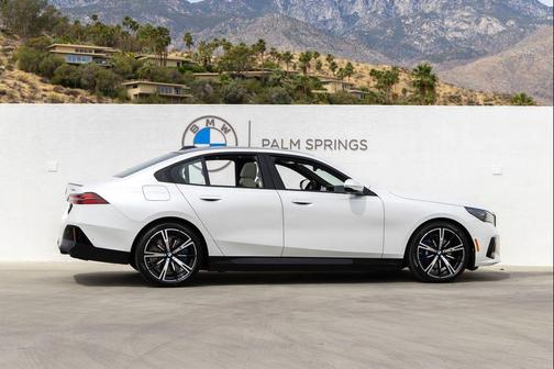 Mineral White Metallic 2026 BMW 550e xDrive