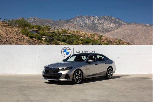 Oxide Grey Metallic 2026 BMW 550e xDrive