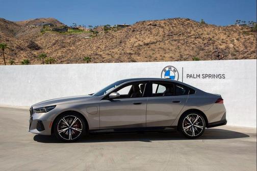 Oxide Grey Metallic 2026 BMW 550e xDrive