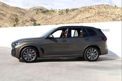 Manhattan Green Metallic 2026 BMW X5 PHEV xDrive50e