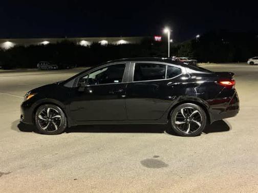 Black 2025 Nissan Versa 1.6 SR