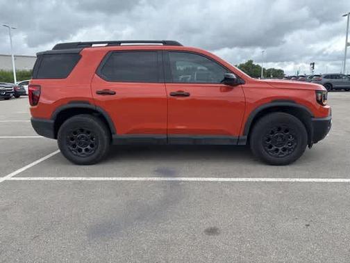 Orange 2026 Honda Passport TrailSport