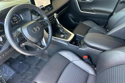 Silver Sky Metallic/Midnight Black Metallic 2024 Toyota RAV4 Hybrid SE