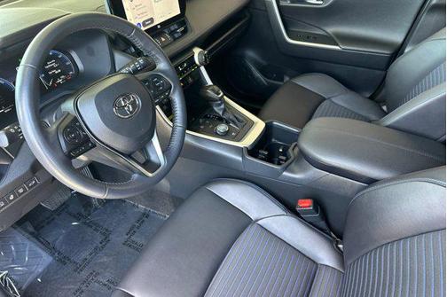 Silver Sky Metallic/Midnight Black Metallic 2024 Toyota RAV4 Hybrid SE