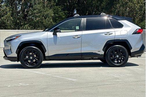 Silver Sky Metallic/Midnight Black Metallic 2024 Toyota RAV4 Hybrid SE