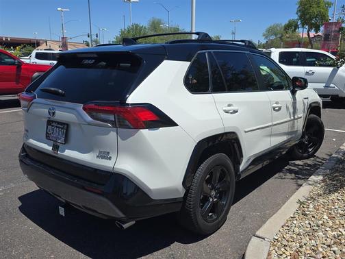 Blizzard Pearl w/Midnight Black Metallic Roof 2020 Toyota RAV4 Hybrid SE