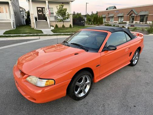 Orange 1996 Ford Mustang GT