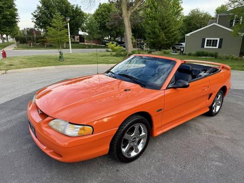 Orange 1996 Ford Mustang GT