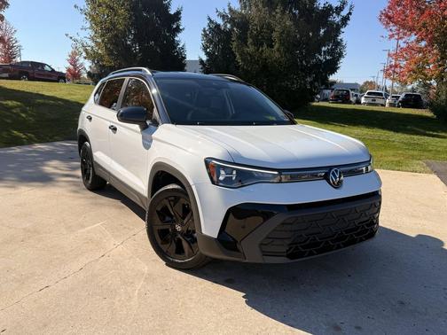 White 2026 Volkswagen Taos SE Black