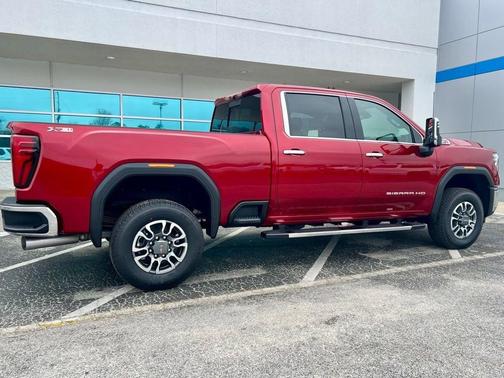 Volcanic Red 2026 GMC Sierra 2500 SLT