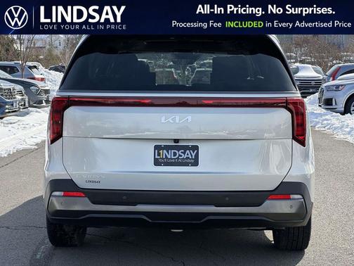 Ivory Silver 2025 Kia Carnival SX