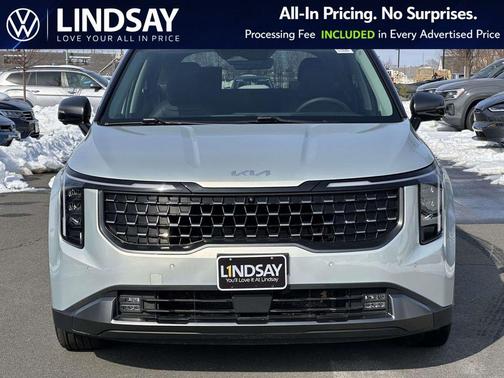 Ivory Silver 2025 Kia Carnival SX