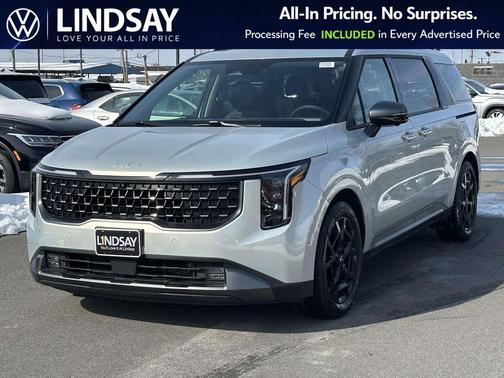 Ivory Silver 2025 Kia Carnival SX