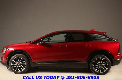 Radiant Red Tintcoat 2025 Cadillac OPTIQ Sport 1 AWD