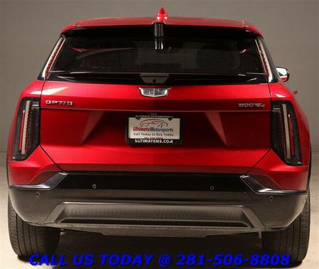Radiant Red Tintcoat 2025 Cadillac OPTIQ Sport 1 AWD