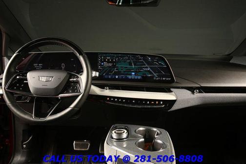 Radiant Red Tintcoat 2025 Cadillac OPTIQ Sport 1 AWD