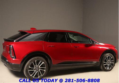 Radiant Red Tintcoat 2025 Cadillac OPTIQ Sport 1 AWD