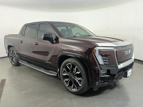 Burgundy 2025 GMC Sierra EV Extended Range Denali