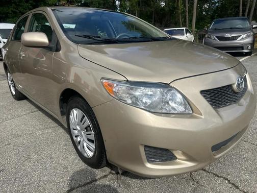 Desert Sand Mica 2010 Toyota Corolla LE
