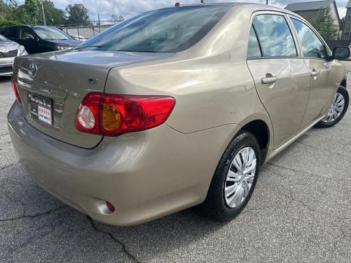 Desert Sand Mica 2010 Toyota Corolla LE