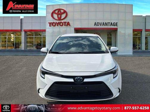 White 2024 Toyota Corolla Hybrid LE