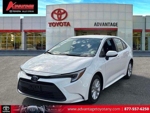 White 2024 Toyota Corolla Hybrid LE