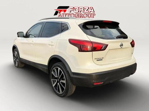 Pearl White Tricoat 2019 Nissan Rogue Sport SL
