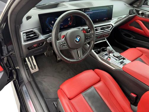 Black Sapphire Metallic 2024 BMW M4 Competition xDrive
