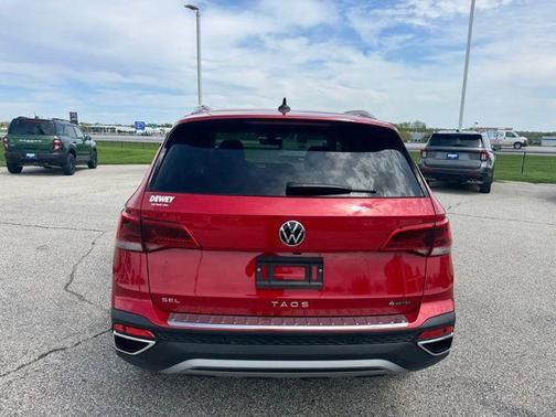 Red Metallic 2024 Volkswagen Taos 1.5T SEL