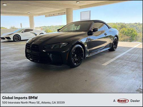 Black Sapphire Metallic 2025 BMW M4 Competition xDrive