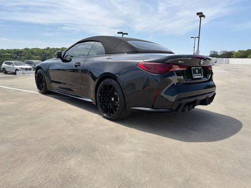 Black Sapphire Metallic 2025 BMW M4 Competition xDrive