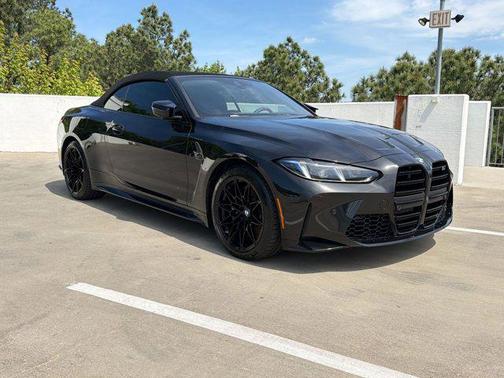 Black Sapphire Metallic 2025 BMW M4 Competition xDrive