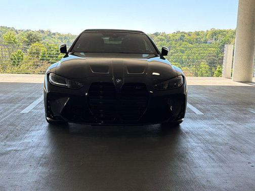 Black Sapphire Metallic 2025 BMW M4 Competition xDrive