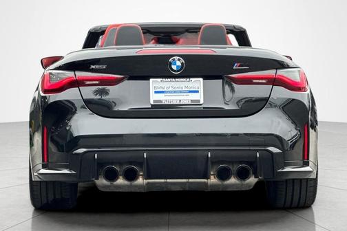 Black Sapphire Metallic 2024 BMW M4 Competition xDrive