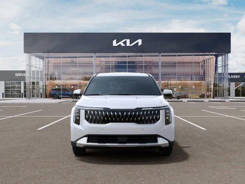 White 2026 Kia Carnival Hybrid EX