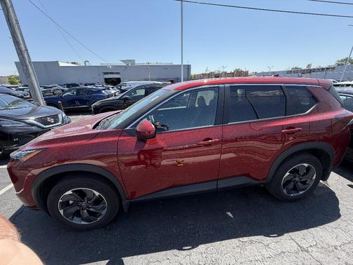 Scarlet Ember Tintcoat 2026 Nissan Rogue SV